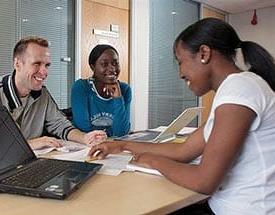 Three students at desk